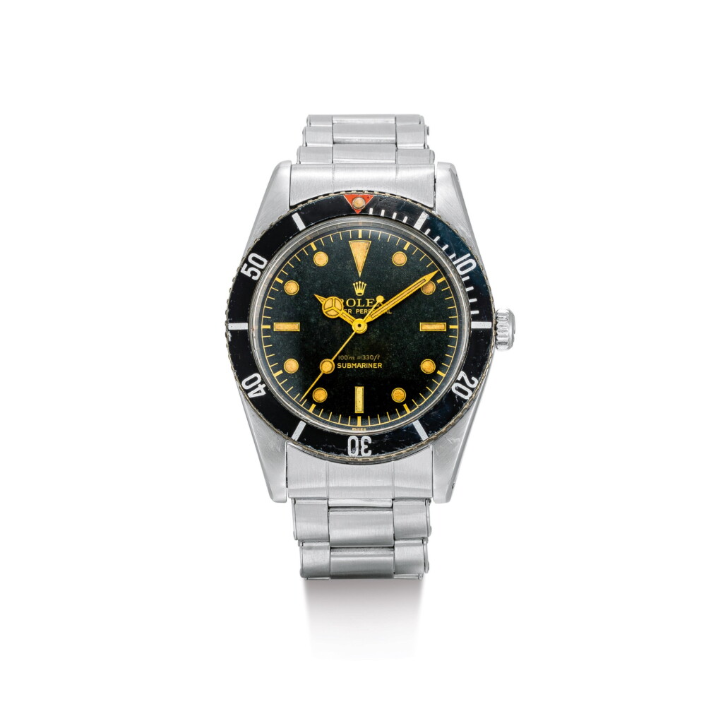 View full screen - View 1 of Lot 2129. ROLEX | SUBMARINER ' JAMES BOND SMALL CROWN', REFERENCE 6536, A STAINLESS STEEL WRISTWATCH WITH BRACELET, CIRCA 1957 | 勞力士 | "Submariner ""James Bond Small Crown"" 型號6536 精鋼鏈帶腕錶,錶殼編號398558,約1957年製".