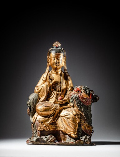 View full screen - View 1 of Lot 61. A gilt and polychrome lacquer bronze figure of a bodhisattva on a lion, Late Ming - early Qing dynasty, 17th century | 明末至清初十七世紀 漆金銅獅吼觀音像.