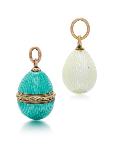 View full screen - View 1 of Lot 13. TWO FABERGÉ GOLD AND GUILLOCHÉ ENAMEL EGG PENDANTS, CIRCA 1900.