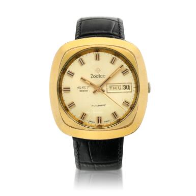 View full screen - View 1 of Lot 7. Reference SST 36000 A gold plated and stainless steel automatic wristwatch with day and date, Circa 1975.