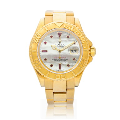 View full screen - View 1 of Lot 8019. Yacht-Master, Reference 16628B, A yellow gold and ruby-set wristwatch with date, mother-of-pearl dial and bracelet, Circa 2004 | 勞力士 Yacht-Master 型號16628B 黃金鑲紅寶石鏈帶腕錶,備日期顯示及珠母貝錶盤,約2004年製.