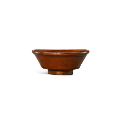 View full screen - View 1 of Lot 428. A persimmon-glazed dish, Northern Song – Jin dynasty 北宋至金 柿釉敞口小盤.