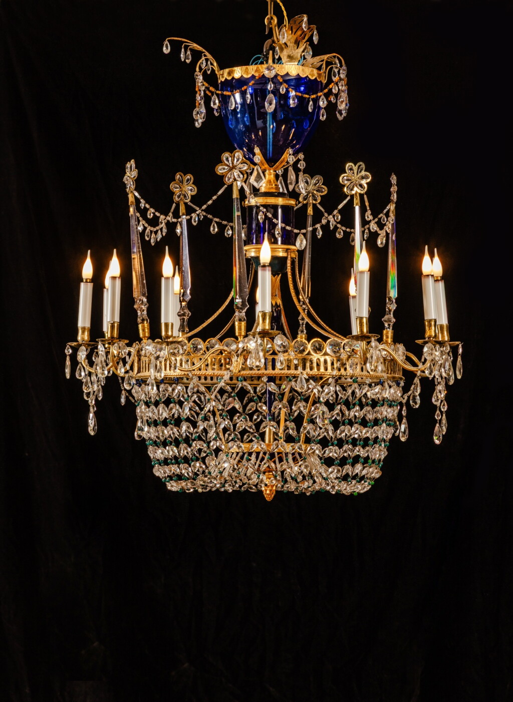 View full screen - View 1 of Lot 252. A gilt-bronze, crystal and blue glass twelve-light chandelier, probably St Petersburg, circa 1790.