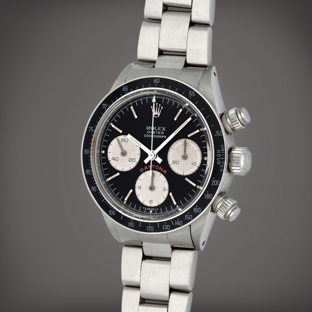 View full screen - View 1 of Lot 76. Daytona 'Big Red', Reference 6263 | A stainless steel chronograph wristwatch with bracelet | Circa 1978.