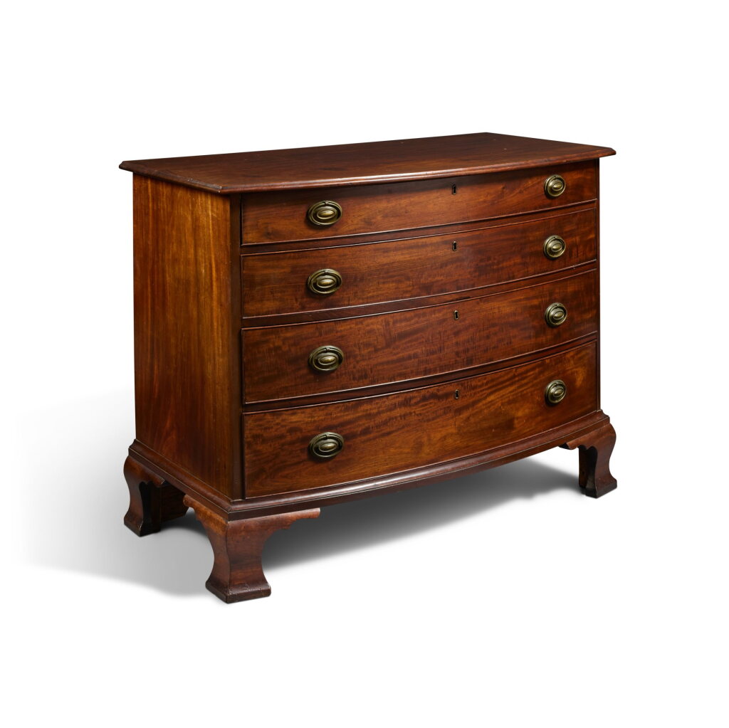 View full screen - View 1 of Lot 116. A Chippendale Figured Mahogany Bow-Front Chest of Drawers, Possibly by Luther Metcalf (1756-1838), Salem, Massachusetts, Circa 1800.