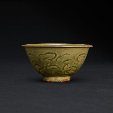 View full screen - View 1 of Lot 621. A Yaozhou celadon carved 'peony' bowl, Northern Song dynasty 北宋 耀州窰青釉刻牡丹紋盌.