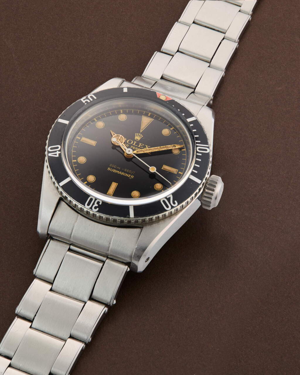 View full screen - View 1 of Lot 76. Reference 5510 ‘Big Crown’ Submariner | A virtually new old stock stainless steel automatic wristwatch with bracelet, Circa 1958.