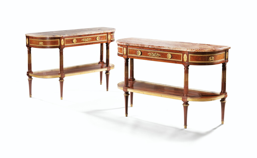 View full screen - View 1 of Lot 76. A PAIR OF LOUIS XVI MAHOGANY VENEERED CONSOLES, STAMPED P.GARNIER | PAIRE DE CONSOLES-DESSERTES EN PLACAGE D'ACAJOU D'ÉPOQUE LOUIS XVI, ESTAMPILLÉE P.GARNIER.