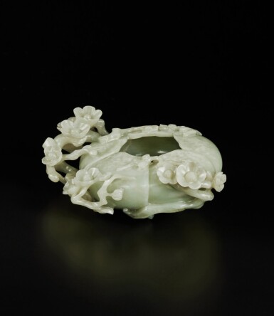View full screen - View 1 of Lot 205. A celadon jade 'prunus' waterpot, Qing dynasty, 17th / 18th century | 清十七 / 十八世紀 青玉梅花形水盂.