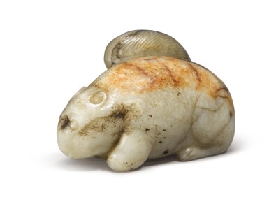 View full screen - View 1 of Lot 690. A gray and russet jade carving of a squirrel, Ming dynasty.