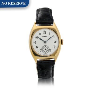 View full screen - View 1 of Lot 135. A yellow gold tonneau shaped wristwatch, Circa 1937.