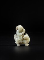 A celadon jade 'immortal riding a lion' group, Qing dynasty, 18th / 19th century
