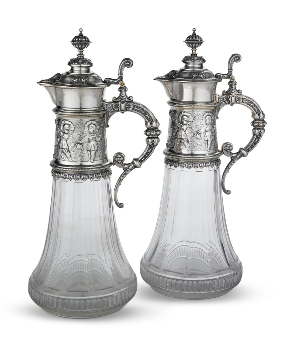 View full screen - View 1 of Lot 231. A Pair of German Silver and Cut-Glass Claret Jugs, Koch & Bergfeld, Bremen, Circa 1890.