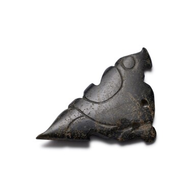 View full screen - View 1 of Lot 224. A black jade bird-form pendant, Shang / Western Zhou dynasty | 商 / 西周 玉鳥形飾.