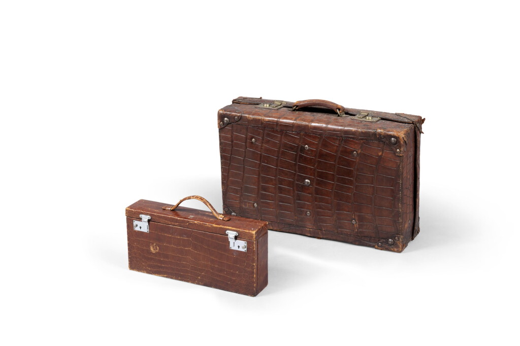 View full screen - View 1 of Lot 2146. A crocodile suitcase and a vanity, mid 20th century | Une valise et un vanity en crocodile, milieu du XXe siècle.