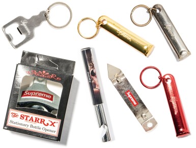 View full screen - View 1 of Lot 82. A GROUP OF 7 SUPREME BOTTLE OPENERS.