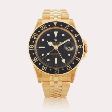 View full screen - View 1 of Lot 13. Reference 1675 GMT-Master ‘Nipple dial’ | A yellow gold automatic dual time zone wristwatch with date and bracelet, Circa 1971.