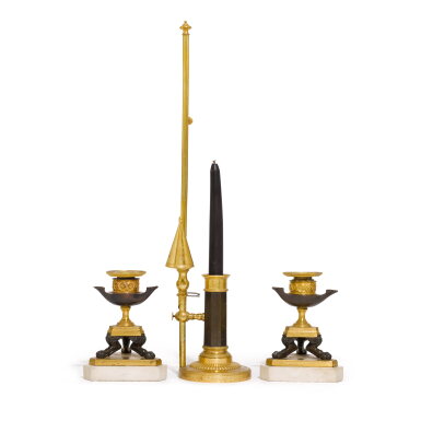 View full screen - View 1 of Lot 123. A French patinated and gilt-bronze candlestick, first half 19th century.