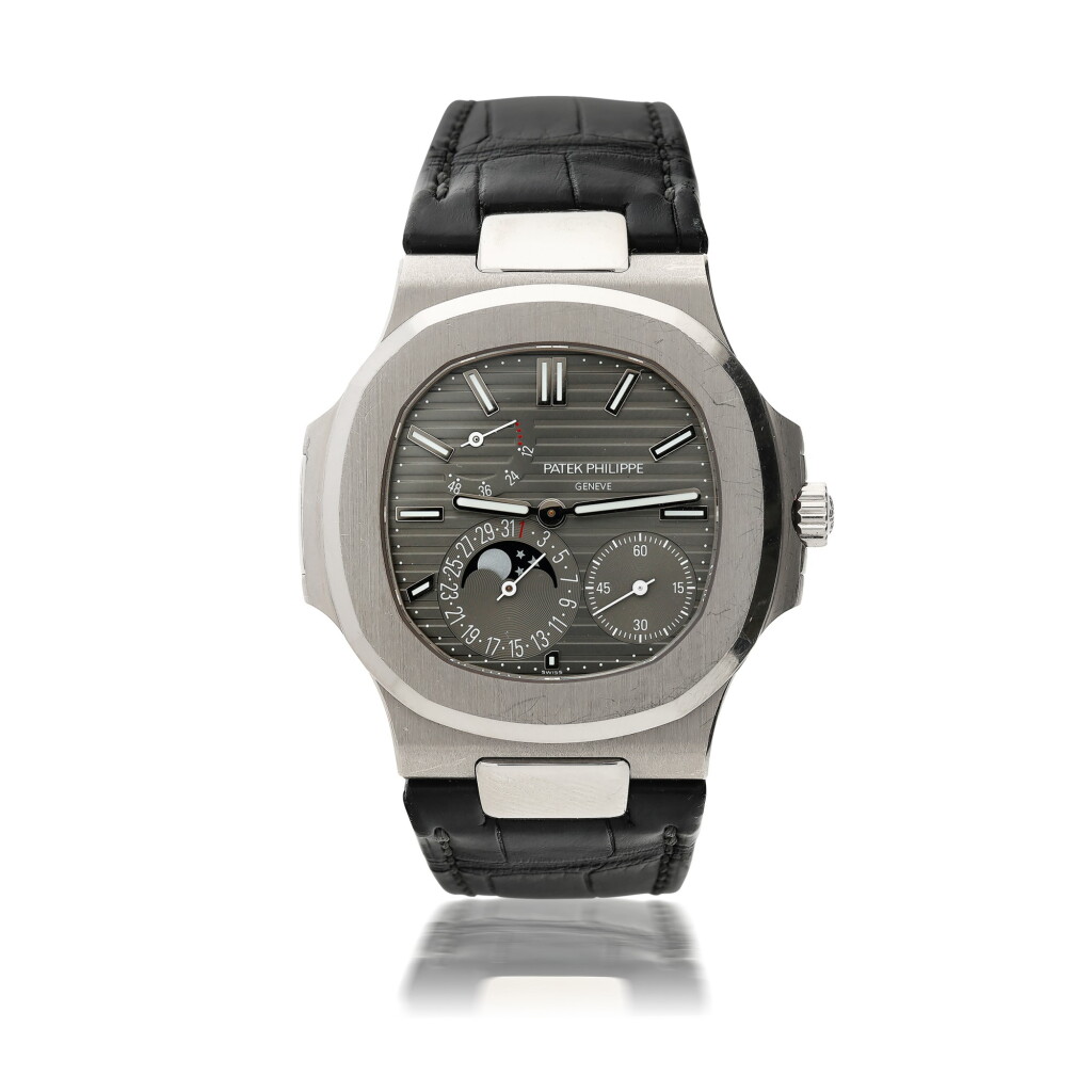 View full screen - View 1 of Lot 69. PATEK PHILIPPE | REFERENCE 5712G NAUTILUS A WHITE GOLD AUTOMATIC WRISTWATCH WITH DATE, MOON PHASES, AND POWER RESERVE INDICATION, CIRCA 2018.
