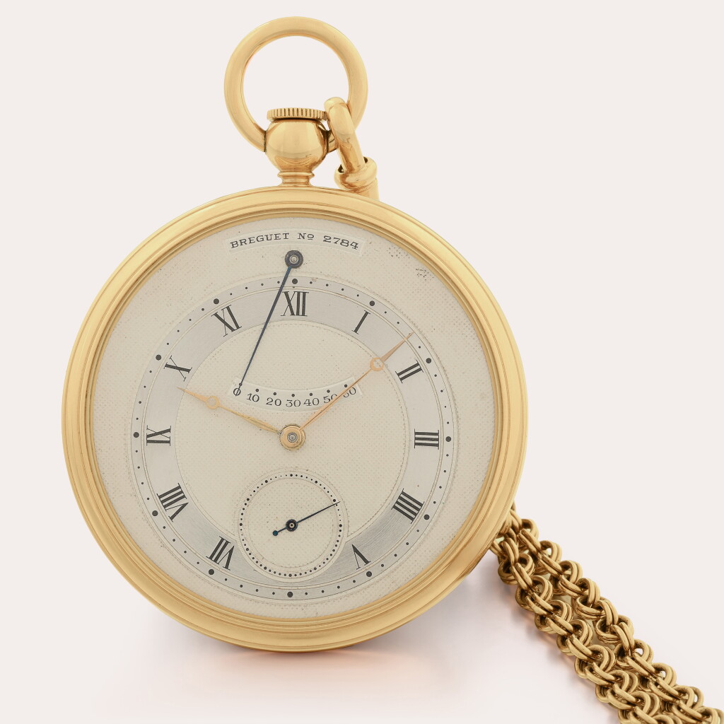 View full screen - View 1 of Lot 47. A very fine 18ct gold open-faced montre perpétuelle with state-of-wind indication accompanied by Breguet certificate, gold chain and fitted presentation case .