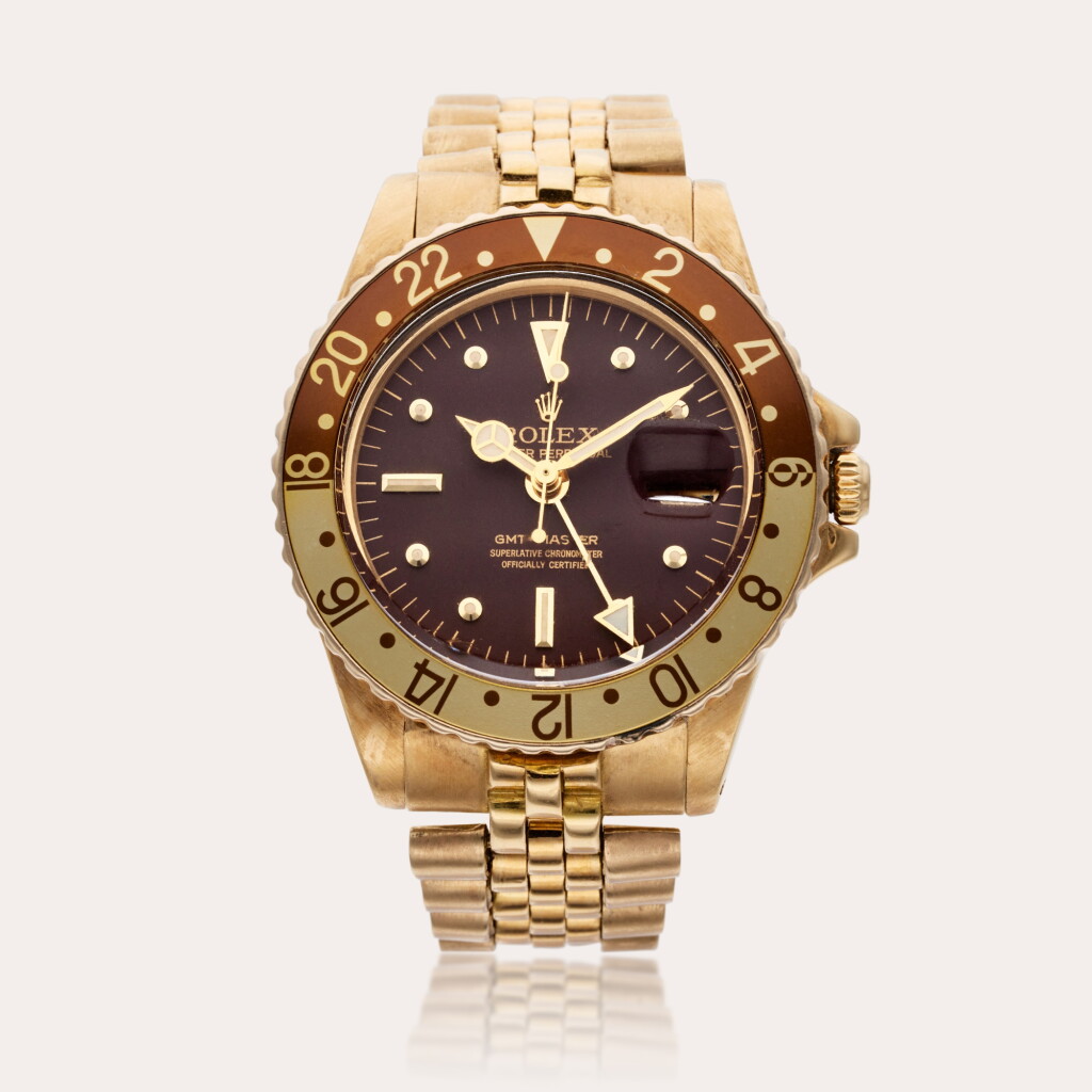 View full screen - View 1 of Lot 562. Reference 1675 GMT-Master | A yellow gold automatic dual time wristwatch with date and bracelet, Circa 1971.