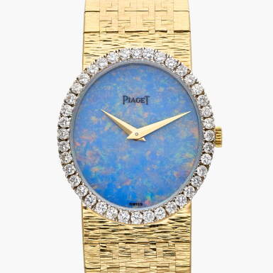 View full screen - View 1 of Lot 528. Reference 9826 A6 | A yellow gold and diamond-set bracelet watch, Circa 1975.