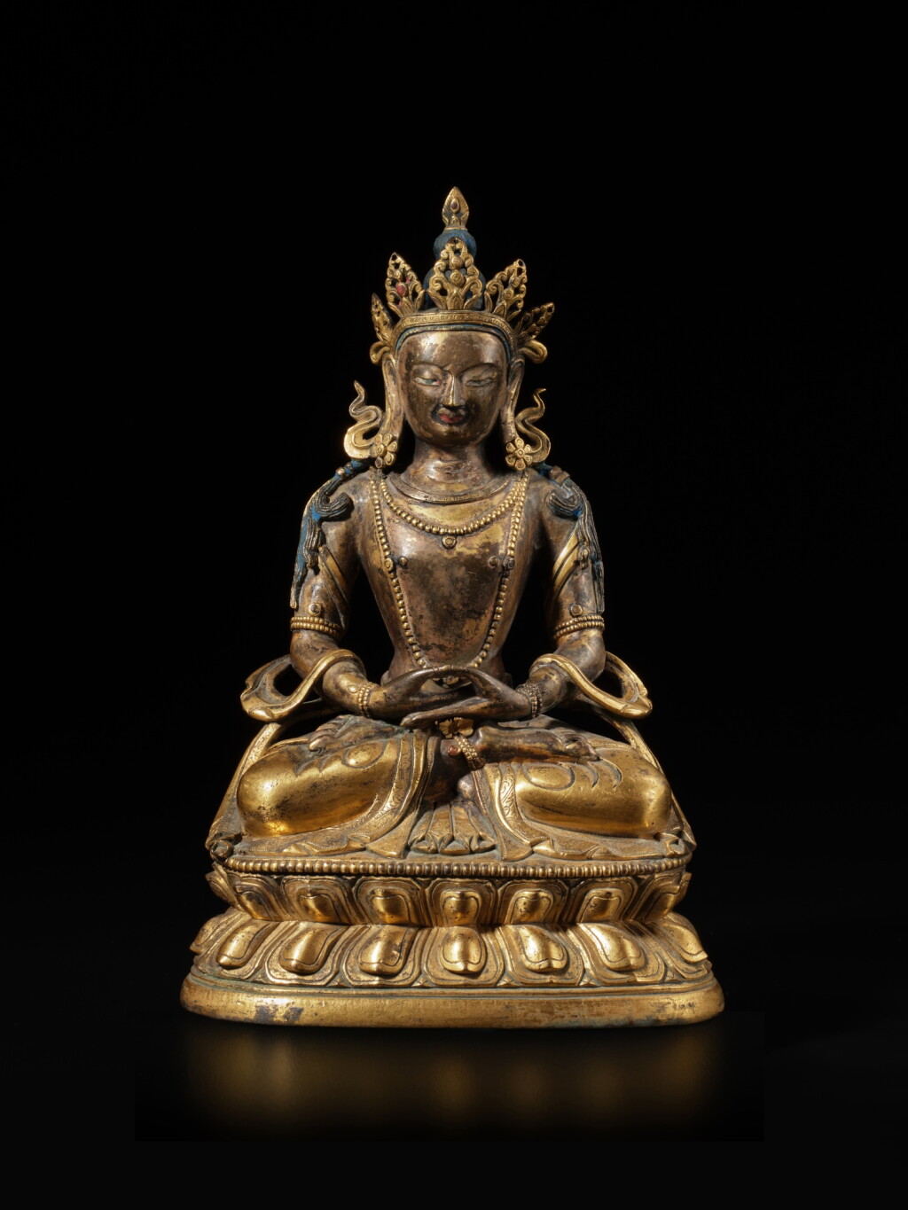 View full screen - View 1 of Lot 814. A gilt-bronze figure of Amitayus, Qing dynasty, 18th century | 清十八世紀 銅鎏金無量壽佛坐像.