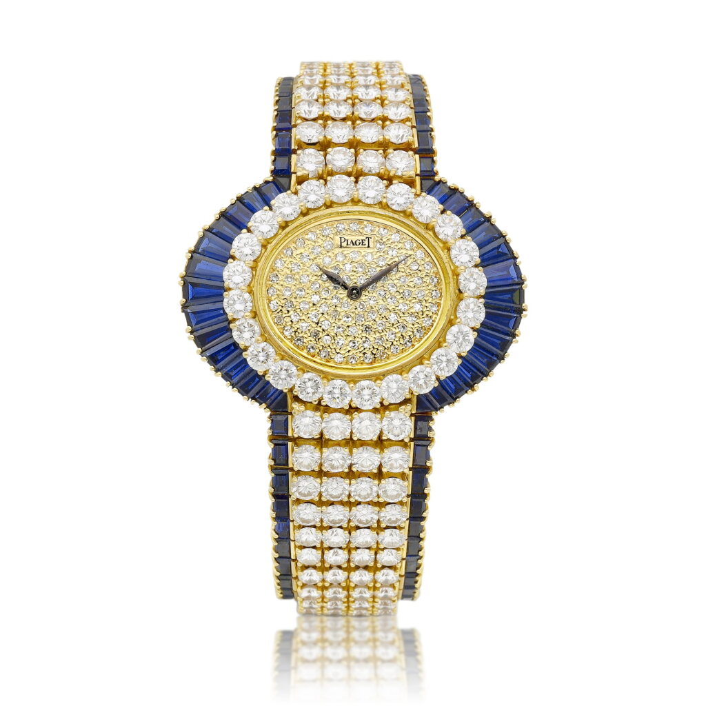 View full screen - View 1 of Lot 8605. A yellow gold, diamond and sapphire-set bracelet watch, Circa 1995 | 伯爵 | 黃金鑲鑽石及藍寶石鏈帶腕錶,約1995年製.