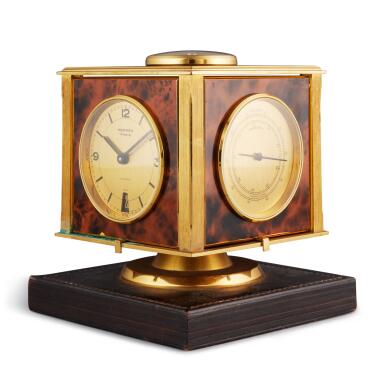 View full screen - View 1 of Lot 92. A painted gilt brass, and leather desk compendium with date, thermometer, barometer, hygrometer, and compass Circa 1960.