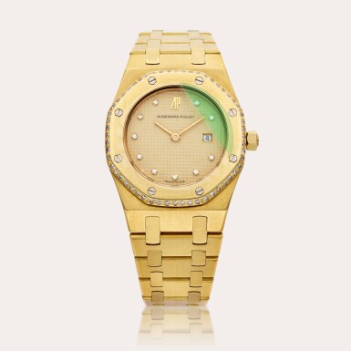 View full screen - View 1 of Lot 357. Reference 56048BA Royal Oak | A yellow gold and diamond-set wristwatch with date and bracelet, Circa 1985.