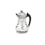 A small silver spirally-fluted coffee-pot on flat base, Arnaud Lacaze, Montauban, 1750-1751 | Cafetière égoiste marabout à côtes torses en argent par Arnaud Lacaze, Montauban, 1750-1751