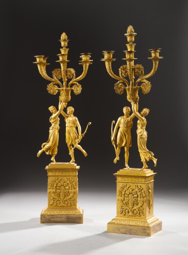 View full screen - View 1 of Lot 68. A pair of gilt-bronze six-light candelabra, Charles X, circa 1825 | Paire de candélabres "Apollon et Diane" à six lumières en bronze doré, d'époque Charles X, vers 1825.