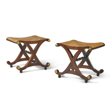 View full screen - View 1 of Lot 89. A pair of Regency style mahogany and parcel-gilt stools, modern.