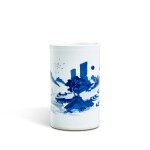 A blue and white 'landscape' brushpot, Late Ming - early Qing dynasty | 明末至清初 青花山水圖筆筒
