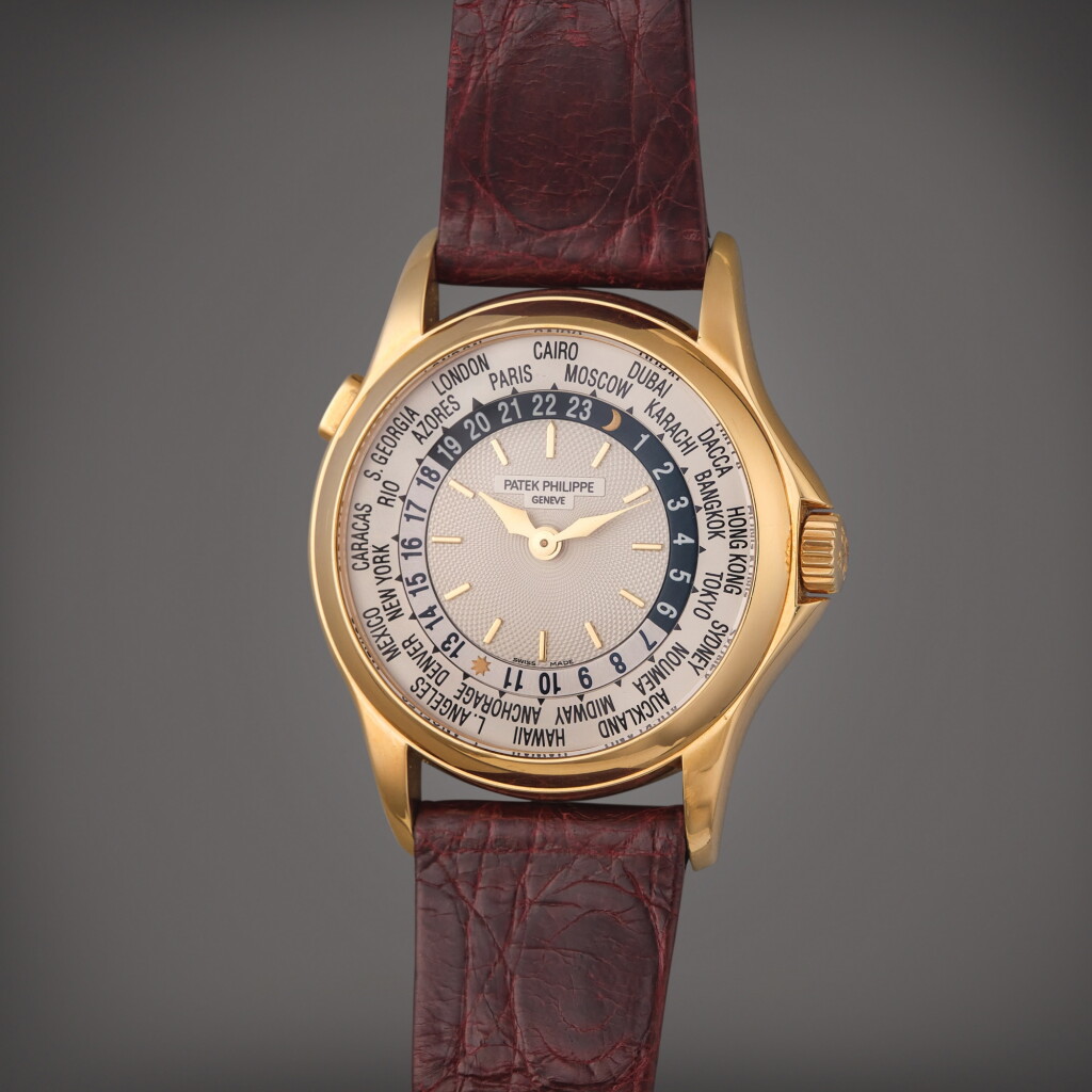 View full screen - View 1 of Lot 353. Reference 5110 World Time | A yellow gold automatic world time wristwatch, Made in 2002.
