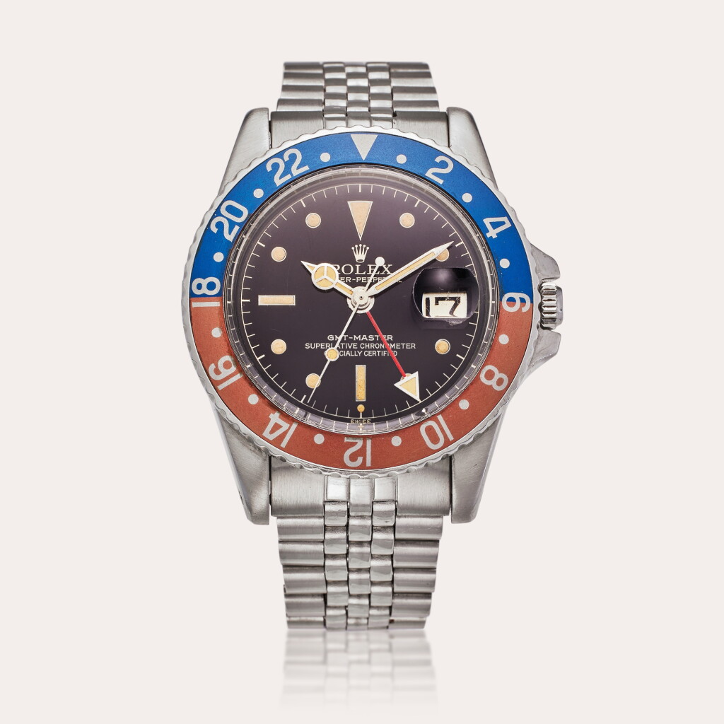 View full screen - View 1 of Lot 171. Reference 1675 GMT-Master 'Pepsi' | A stainless steel automatic dual time zone wristwatch with exclamation point dial, eagle beak crown guards, date and bracelet, Circa 1961.