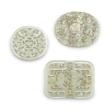 View full screen - View 1 of Lot 1139. THREE RETICULATED JADE PLAQUES QING DYNASTY | 清 青白玉透雕珮飾一組三件.