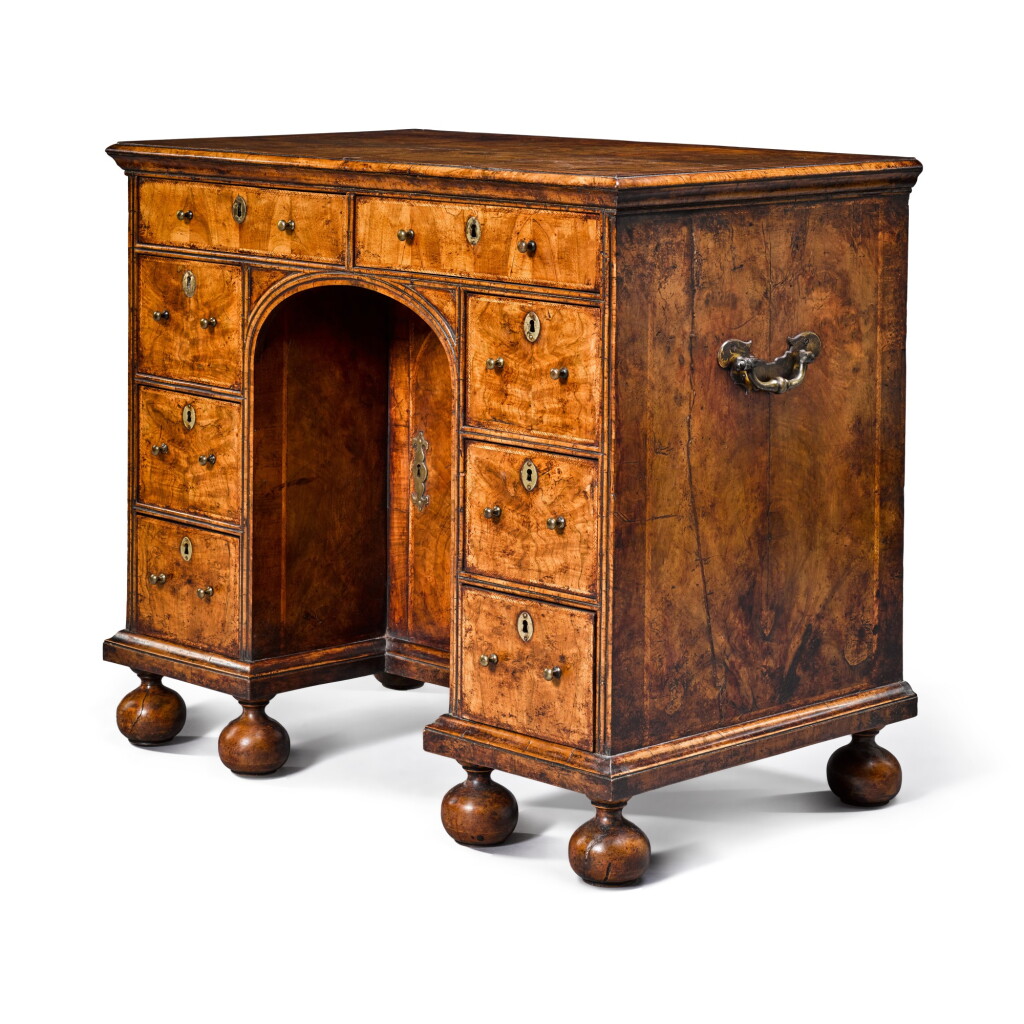 View full screen - View 1 of Lot 12. A Queen Anne walnut kneehole desk, early 18th century.