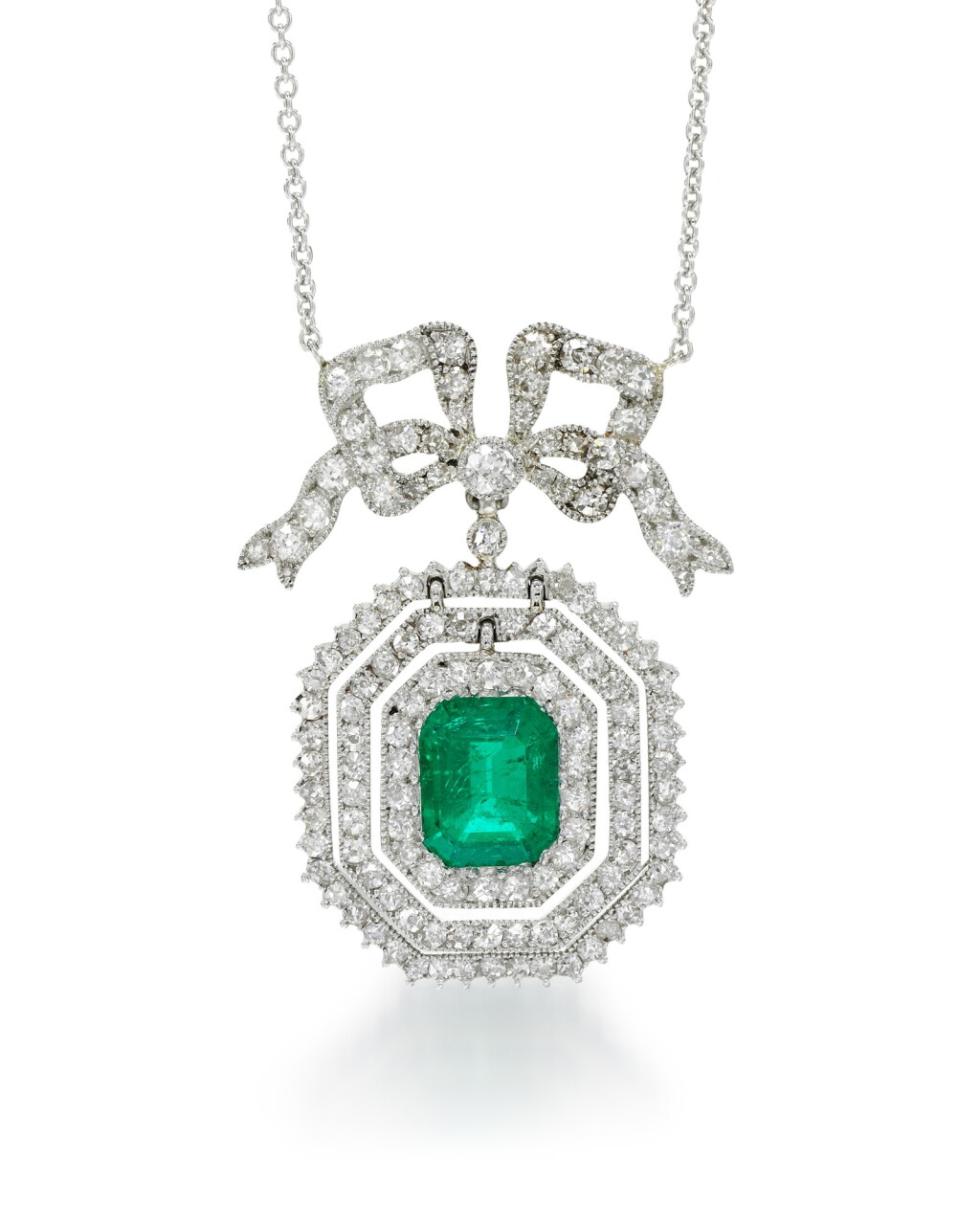 View full screen - View 1 of Lot 325. EMERALD AND DIAMOND PENDANT NECKLACE.