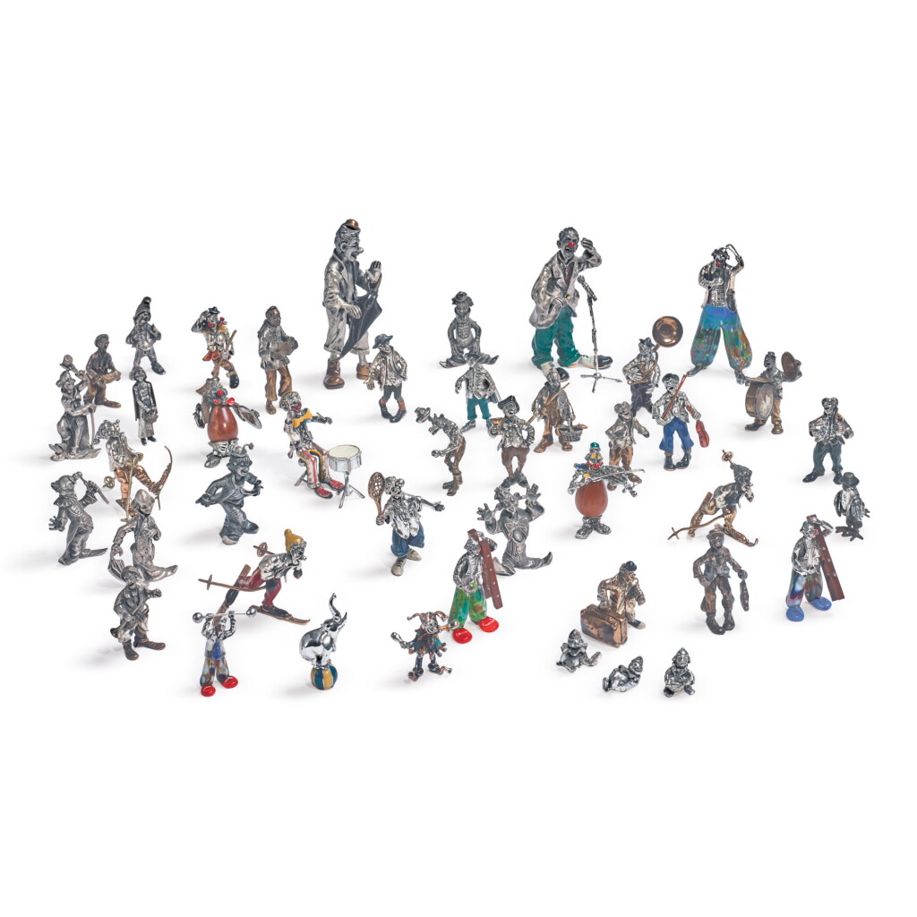View full screen - View 1 of Lot 382. A GROUP OF FORTY-THREE ITALIAN SILVER AND ENAMEL CLOWNS, ARREZO, LATE 20TH CENTURY.