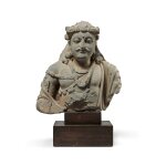 A gray schist bust of a bodhisattva, Ancient region of Gandhara, circa 2nd / 3rd century | 犍陀羅 約二 / 三世紀 灰片岩雕菩薩半身像 