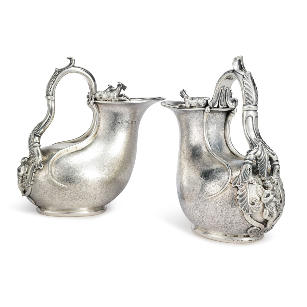 View full screen - View 1 of Lot 236. TWO MATCHING VICTORIAN SILVER ASKOS JUGS, JOHN S. HUNT, 1853 AND 1857.