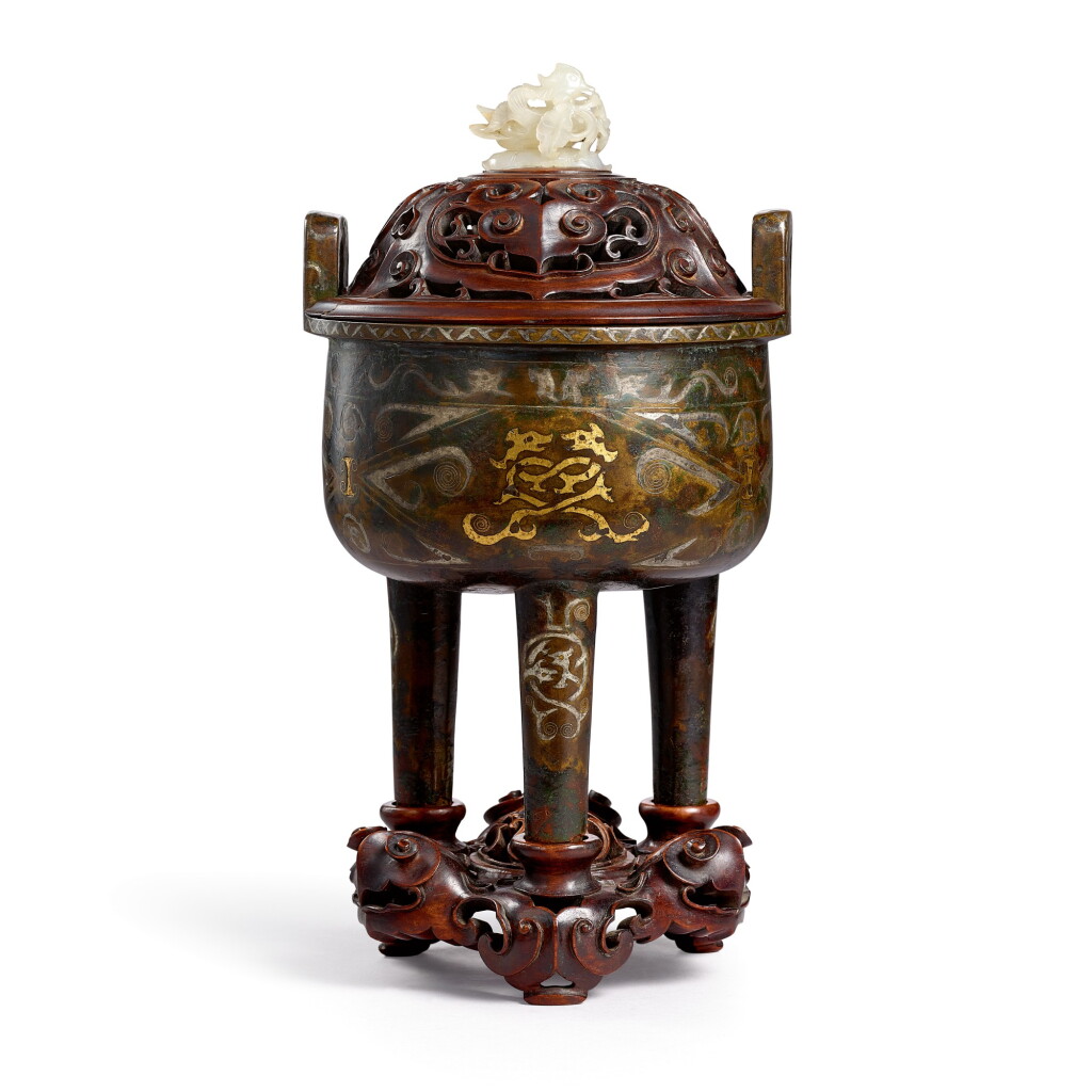View full screen - View 1 of Lot 3684. A gold and silver-inlaid bronze incense burner, ding Late Ming – early Qing dynasty | 明末至清初 銅錯金銀鏨雲龍紋鼎式爐.
