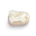 An imperial white jade oval 'Chunyuxuan' seal Qing dynasty, 18th century | 清十八世紀 御製白玉橢圓獸鈕寶璽 印文:春雨軒