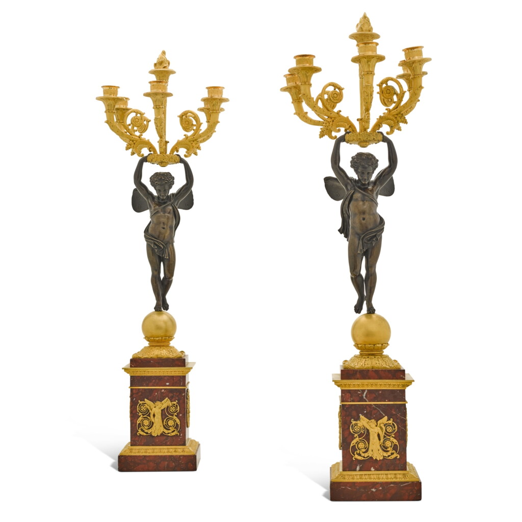 View full screen - View 1 of Lot 120. A pair of Empire gilt and patinated bronze five-light candelabra, early 19th century, attributed to Pierre-Phillipe Thomire.