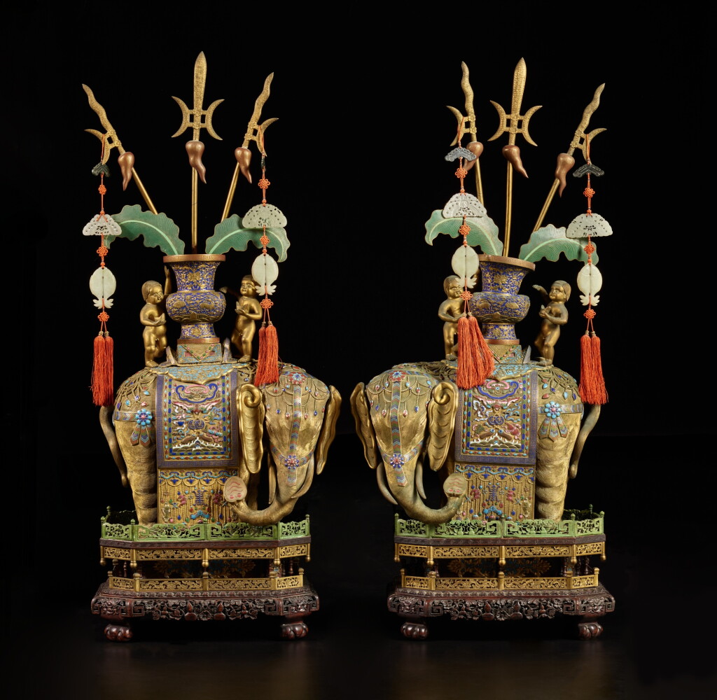 View full screen - View 1 of Lot 184. A pair of gilt-bronze and champlevé enamel elephants, 19th / 20th century .