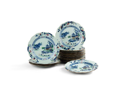 View full screen - View 1 of Lot 1056. A set of eighteen blue and white and famille-rose ‘pagoda’ lobed rim dishes, Qing dynasty, 18th – 19th century l Ensemble de dix-huit plats lobés en porcelaine bleu blanc et de la famille, dynastie Qing, XVIIIe - XIXe siècle.