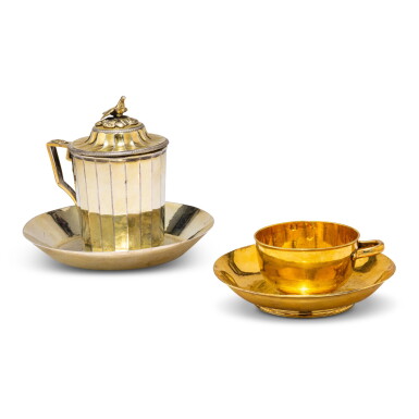 View full screen - View 1 of Lot 450. Two silver-gilt tea cups, Paris, 1789-1790, one with cover | Deux tasses et leurs soucoupes en vermeil, Paris, 1789-1790, l'une couverte.