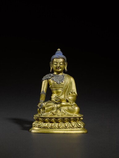 View full screen - View 1 of Lot 181. A gilt-bronze figure of Medicine Buddha, Qing dynasty, 18th century | 清十八世紀 鎏金銅藥師佛坐像.