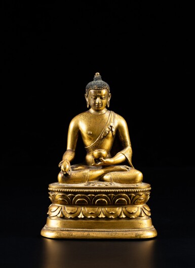 View full screen - View 1 of Lot 35. A rare Zanabazar school gilt-bronze figure of Bhaisajyaguru Buddha, Mongolia, 18th century | 蒙古 十八世紀 扎那巴扎爾風格 鎏金銅藥師佛坐像.